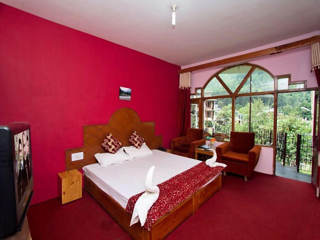 Himanshu Resorts Manāli Rum bild