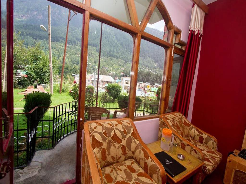 Himanshu Resorts Manāli Rum bild