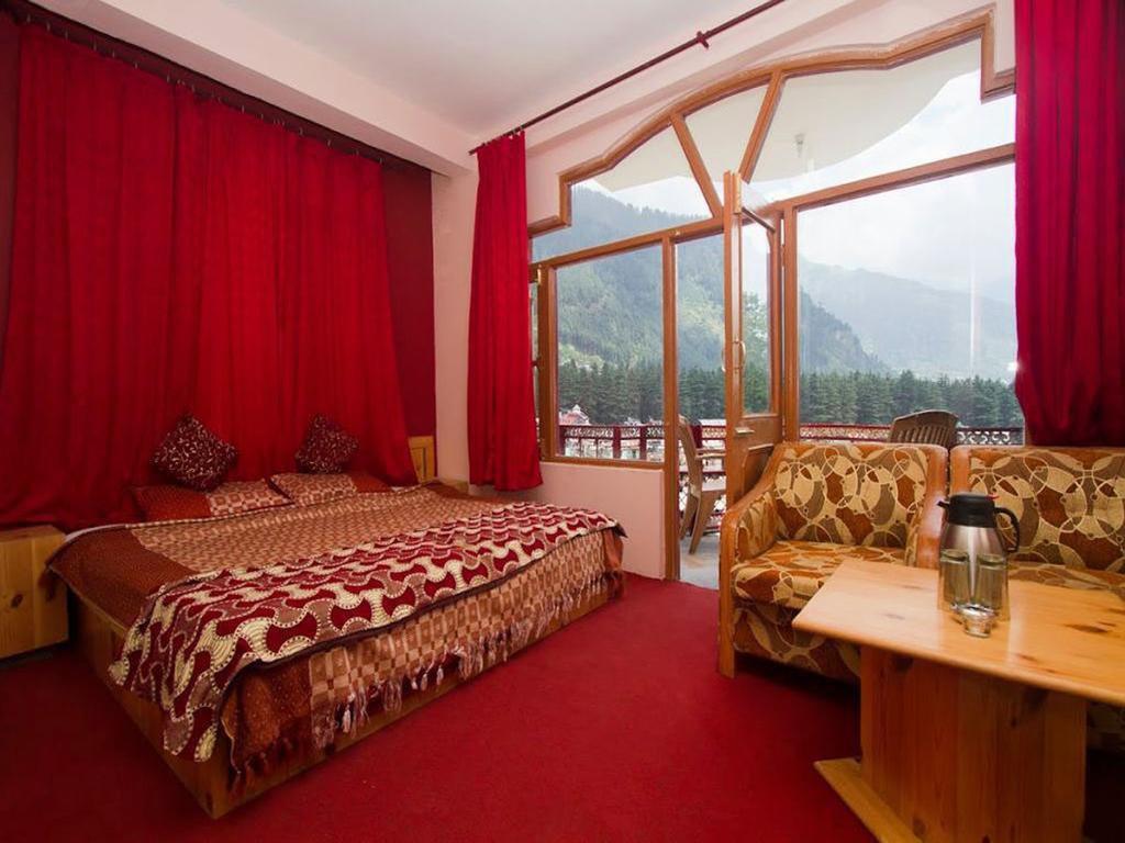 Himanshu Resorts Manāli Rum bild